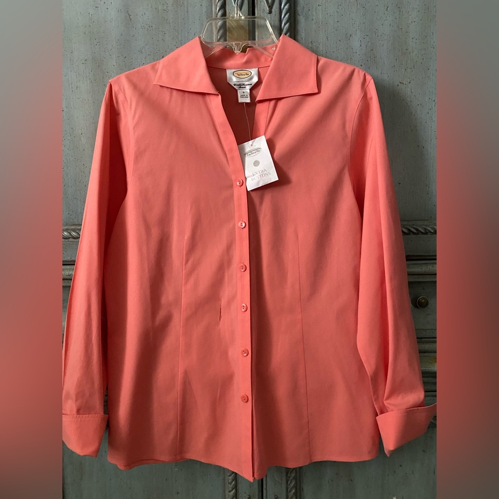 Pop-of-color, bright coral long sleeve blouse with v neck and offset collar